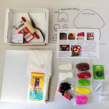 red toadstool woodland themed birthday party cake kit contents from Cake 2 The Rescue